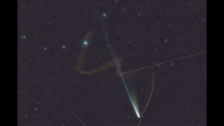 ‘Miracle’ photo captures Comet Lemmon and meteor seemingly entwined over Earth
