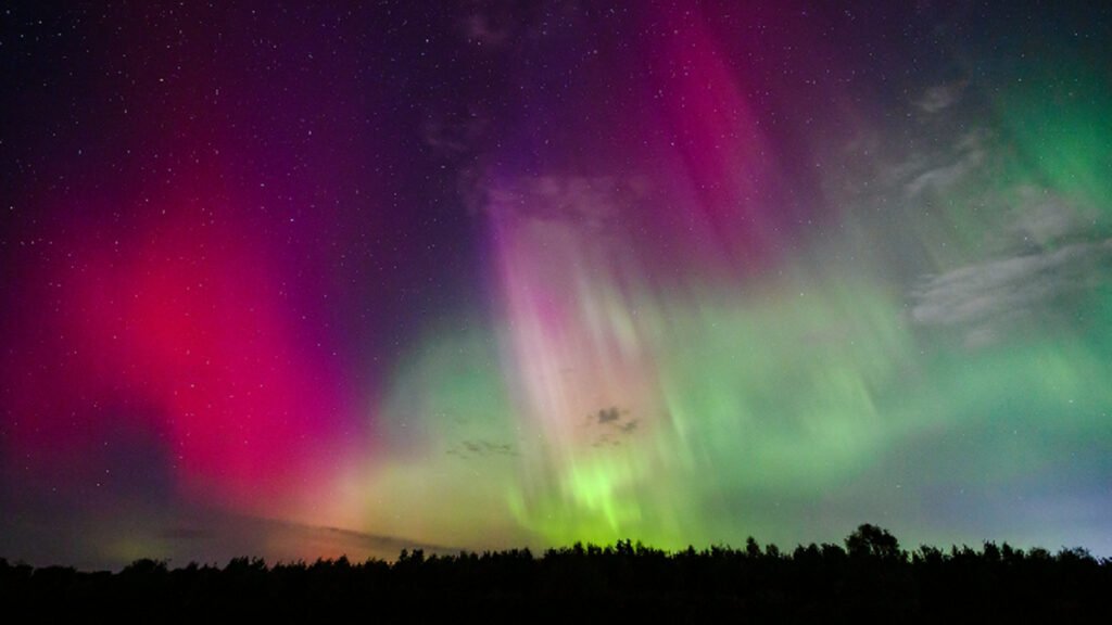 Superbright ‘Comet Lemmon’ flies through auroras over Scotland during surprise solar storm