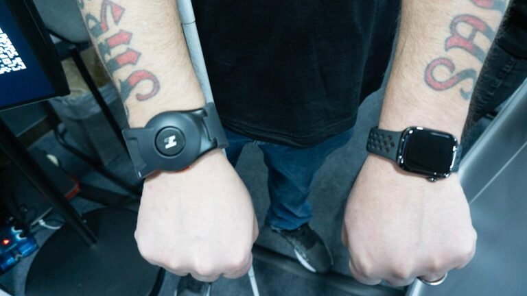 This haptic wristband pairs with Meta smart glasses to decode facial expressions